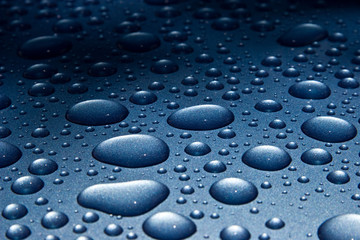 Water Droplets on Blue Metal