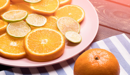 Fototapeta na wymiar citrus slices on a wooden background