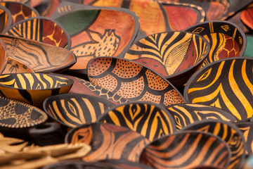 Colorful Patterns on Plates and Bowls - Wooden Souvenirs from Africa