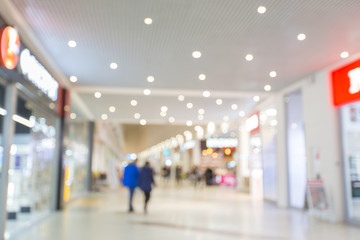 Fototapeta premium Blur bokeh background of market gallery 