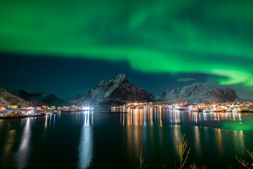 Northern lights over the vilage of Reine, Lofoten, Norway