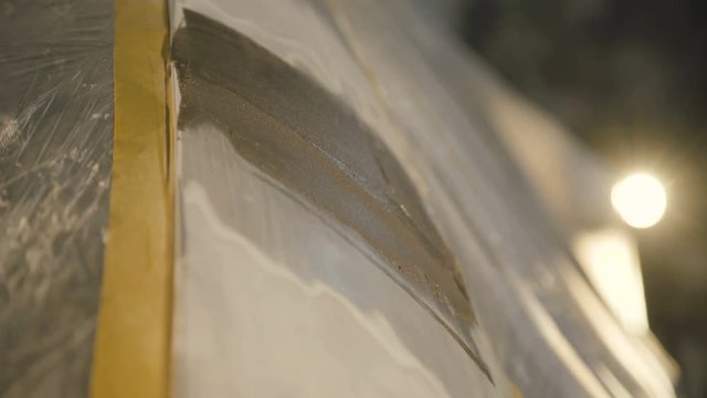 View of priming dent on the car surface 4K