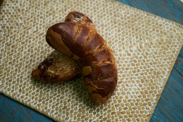 Fresh homemade patties with cottage cheese. Traditional Russian pastry loaf on wooden rustic table