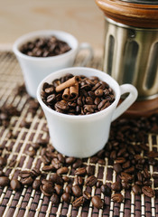 two cups of coffee on a wooden table