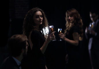 two glamorous woman in a casino