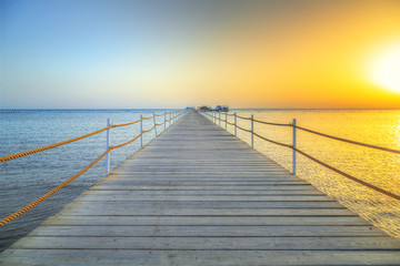 Fototapeta premium Sunrise at the pier of Red Sea in Hurghada, Egypt