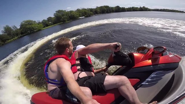 fit guys doing donuts together on seadoo selfie