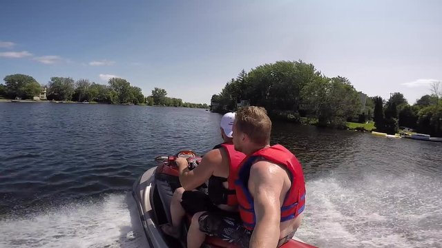 two guys on a seadoo having fun gopro selfie