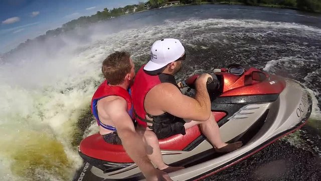 friends on seadoo fall off slow motion doing donuts