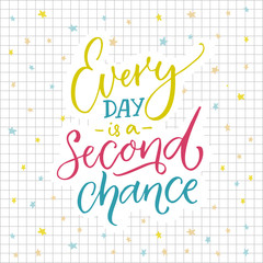 Every day is a second chance. Motivational quote about life. Colorful lettering on sqared paper background.