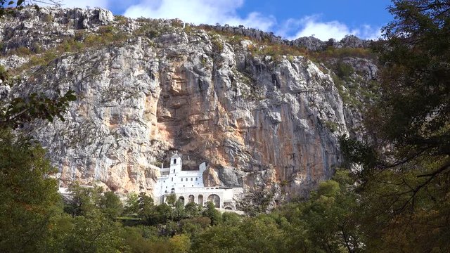 Establishing shot of the Ostrog monastery in Montenegro.