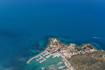 Aerial image of the beautiful town of Talamone at the Tuscany Mediterranean coast