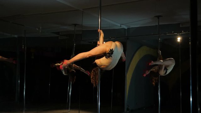 Sexy black hair girl pole dance   	