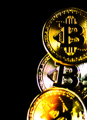 Crypto currency Gold Bitcoin, BTC, macro shot of Bitcoin coins on  background
