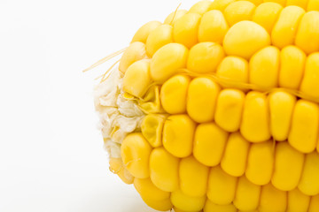 Yellow corn raw isolated on white background, front view from the top, technical cost-up.