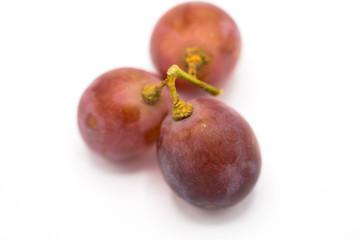 red grape raw isolated on white background, front view from the top, technical cost-up.