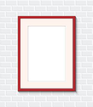 red frame on a brick wall