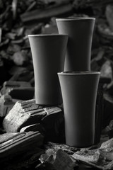 Three matte black shot glass .On charcoal background. Black edition.Creative.Let's...