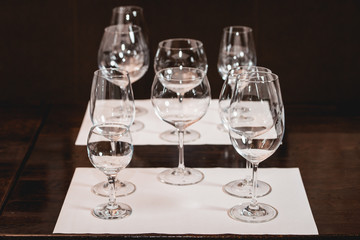 empty glasses of different shapes served for a wine tasting