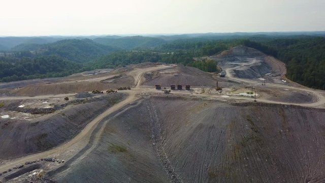 An aerial over a mountaintop removal coal strip mine in West Virginia.