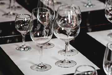 empty glasses of different shapes served for a wine tasting