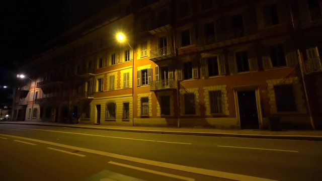 Old house on night dark city street