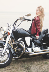 Fototapeta na wymiar Pretty biker woman outdoor 