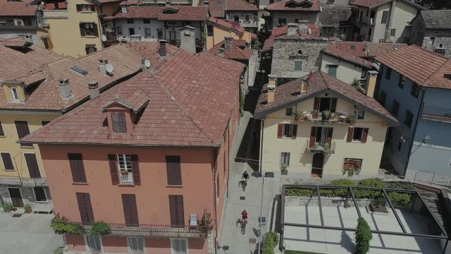 bicycle sumer italy Italian riviera houses drone flight near the mountains, Italy lake, drone 4k nature flight hootel