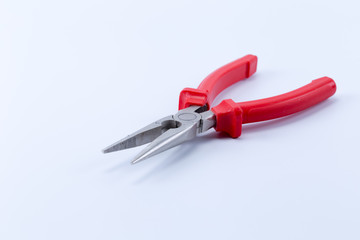 Red Needle Nose Pliers also known as pointy nose pliers or long nose pliers isolated on white background.