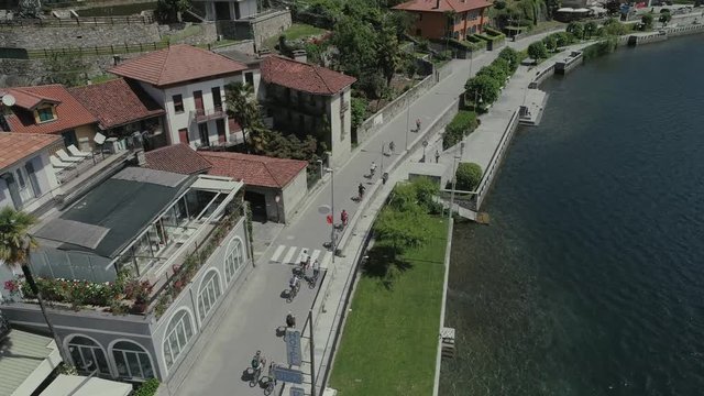 bicycle sumer italy Italian riviera houses drone flight near the mountains, Italy lake, drone 4k nature flight hootel