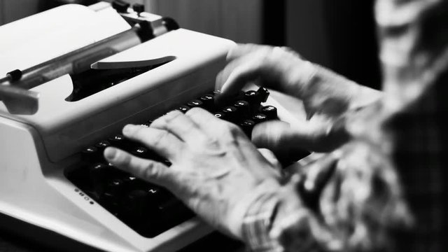 Typing on a vintage typewriter machine. Book writing, film script writing. Writing a love letter by the window, 4K