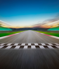 Motion blurred racetrack  . Vertical or poster format .