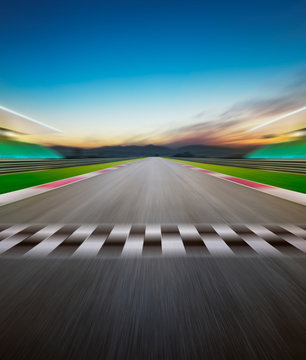 Motion blurred racetrack  . Vertical or poster format .