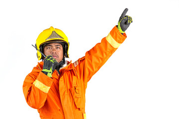 Firefighter in uniform and safety helmet standing full body length