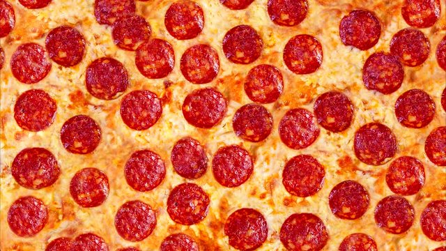 A video of the background pepperoni pizza. Footage.
