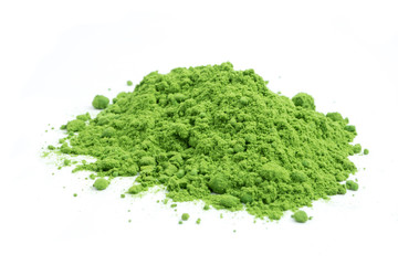 Powdered green tea on white background.