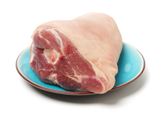 Raw pork leg with bone isolated on whiteboard 