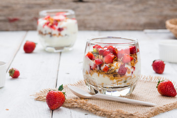 Strawberry , granola and yogurt healthy breakfast parfait