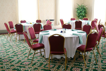 dinner tables and chairs in the banquet hall
