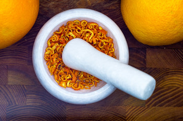 White marble mortar with the orange zest
