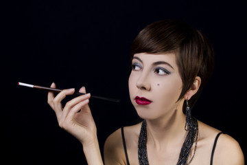 Fototapeta premium Portrait of a young woman in retro style