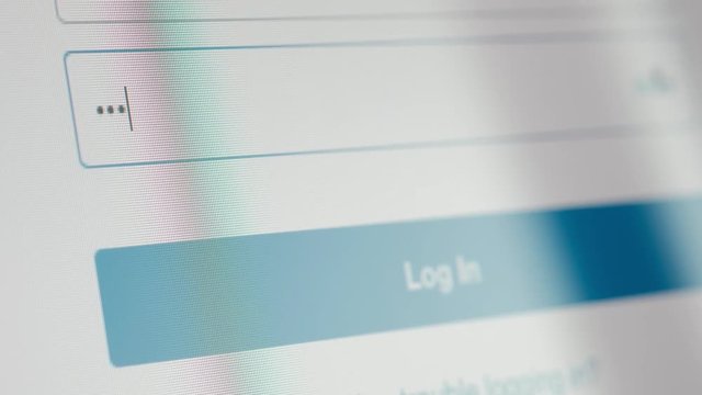 Login on a computer screen working   Entering password on computer screen Privacy Security Protection