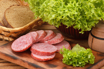 Lettuce salad with smoked sausage