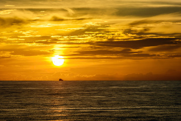 Ocean sunset on board vessel