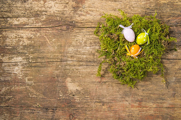 easter nest with painted eggs