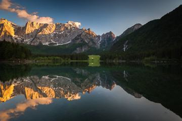 Mountain lake in Italy during sunset. 