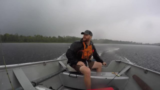 fisherman in dangerous and scary lightning storm
