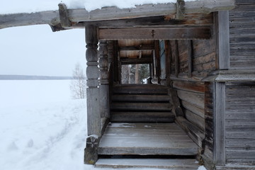 Fototapeta na wymiar Old Russian church in winter nature picture