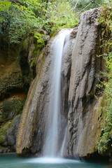 Fototapeta na wymiar Waterfall. A waterfall called Blederia in the east of Serbia. Wonderful decoration of nature. Serbia landscape.