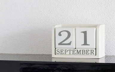 White block calendar present date 21 and month September